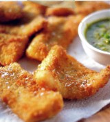 Fishsticks met kokokorst en pittige vinaigrette