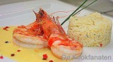 Gamba's, gember op een zalfje van curry mousseline