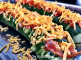 Hasselback courgette met pesto, cheddar en chorizo