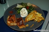Lamsfilet pakje, tomatentapenade, rucola, zondegroogde tomaat, Grana Padano