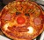 Kinderpizza in de vorm van een clown