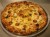Pizza met merguez en fetakaas