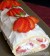 Rolbiscuit met citroenmousse en aardbeien