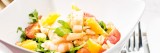 Slaatje met scampi rucola en pijnboompitten