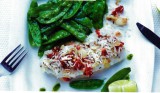 Schelvis in een korstje van chorizo, sluimererwten in olie van fijne kruiden