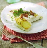Vis uit de oven met aardappelen en paddenstoelen