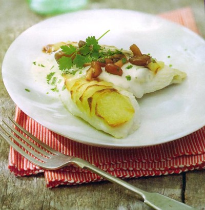 Vis uit de oven met aardappelen en paddenstoelen Vis uit de oven met aardappelen en paddenstoelen