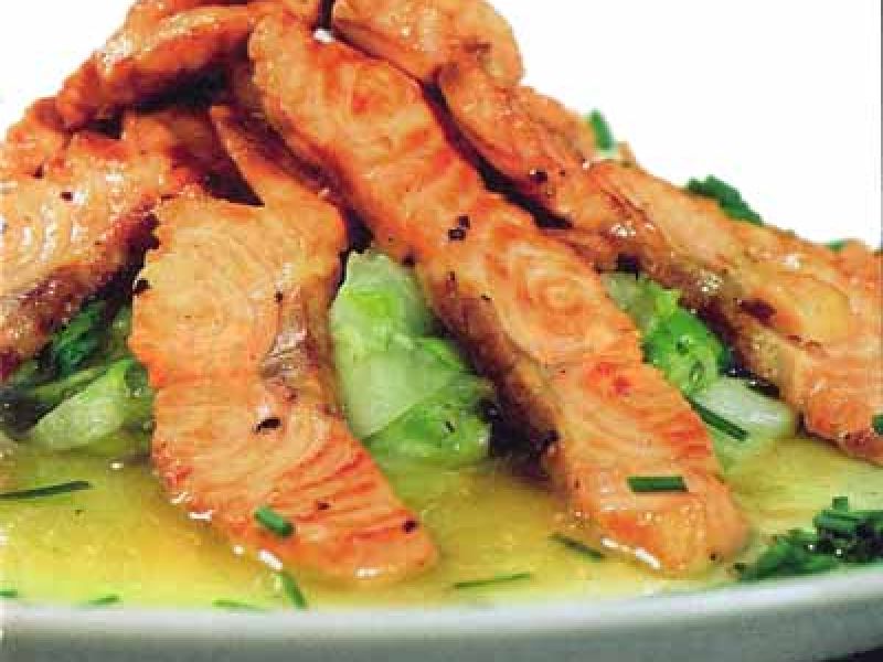 Marinated salmon with fried lettuce and garlic
